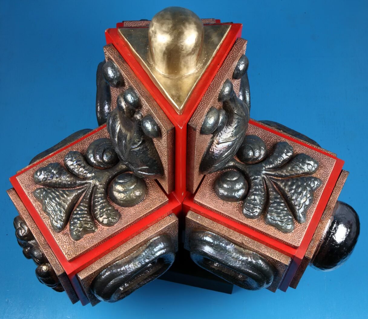 Detail of an embossed copper and welded brass sculpture
